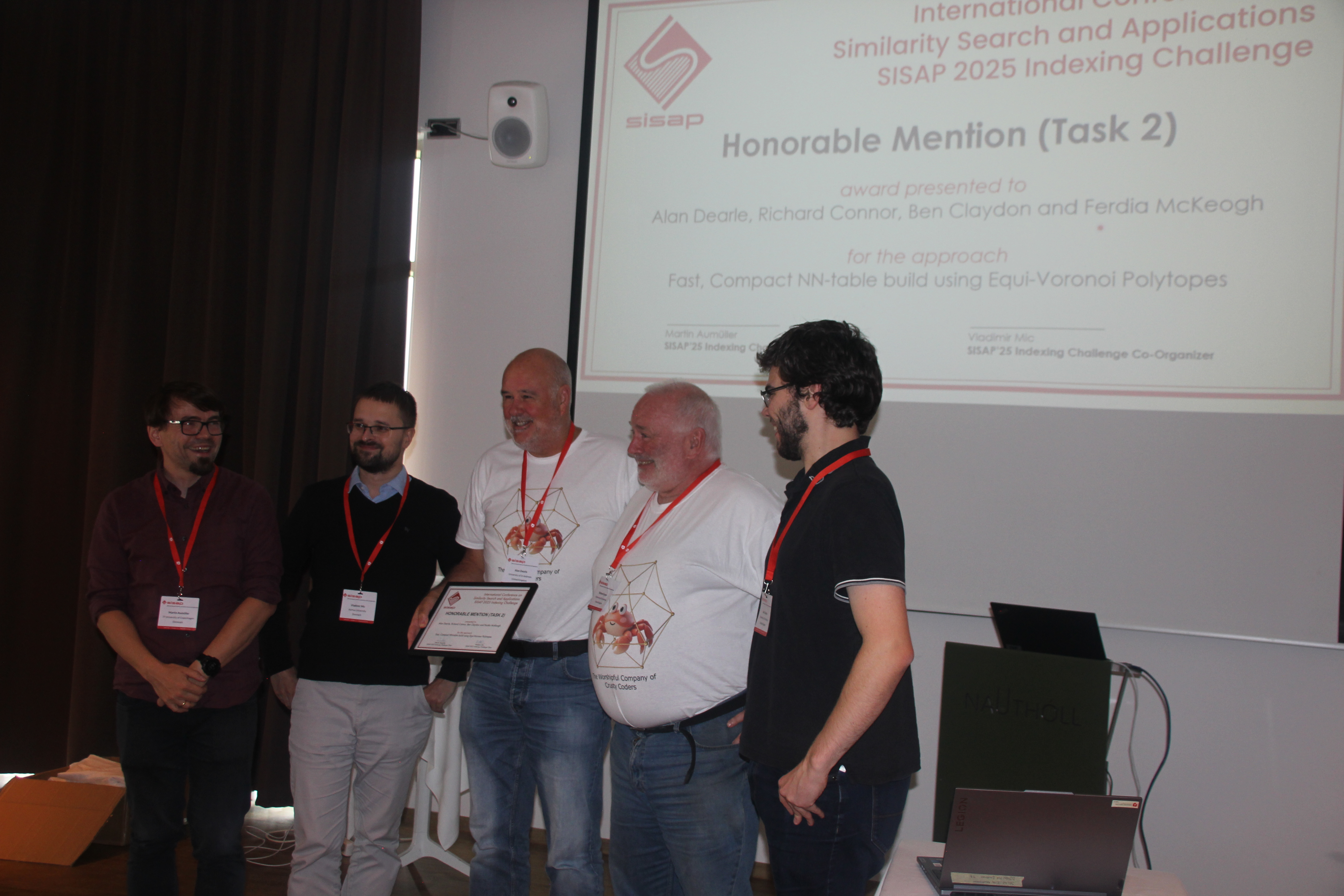 Alan Dearle, Richard Connor, and Ben Claydon representing team Crusty Coders at the award ceremony